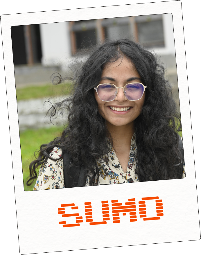 Polaroid photo of Saumya smiling outdoors, captioned SUMO